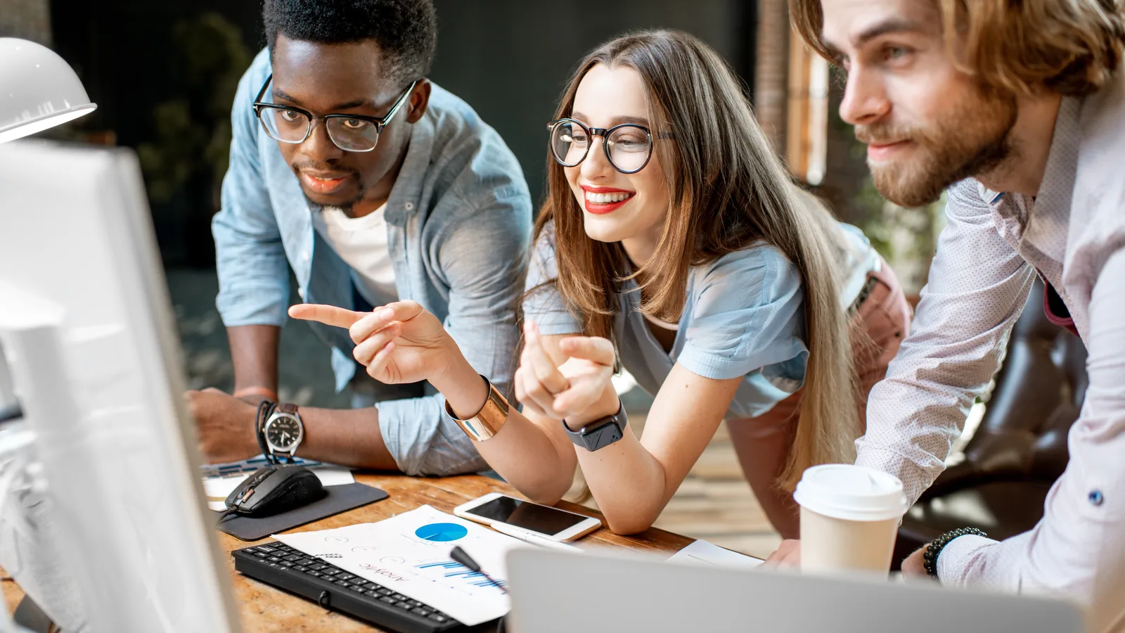 Corporate team collaborating in a modern office
